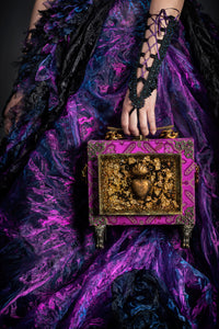 Sacred heart in resin on purple brocade handbag