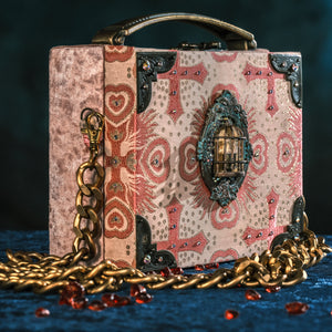 Pink brocade handbag