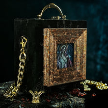 Load image into Gallery viewer, Virgin and child on black and gold velvet hand bag