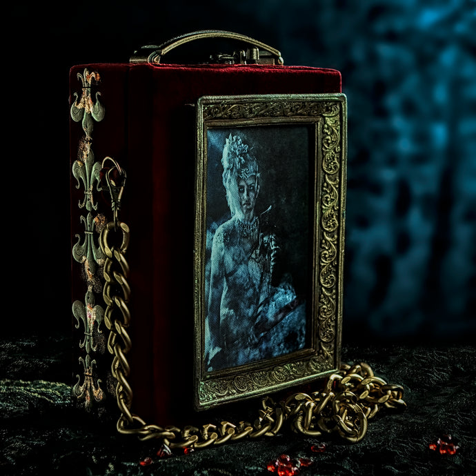 Joan of Arc on burgundy velvet hand bag