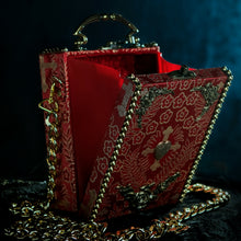 Load image into Gallery viewer, Red brocade handbag framed whith golden spikes