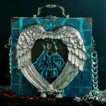 Load image into Gallery viewer, Infanta in a hand carved heart frame hand bag