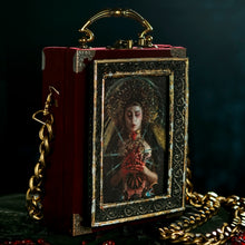 Load image into Gallery viewer, Framed Virgin of Sorrows on red velvet hand bag