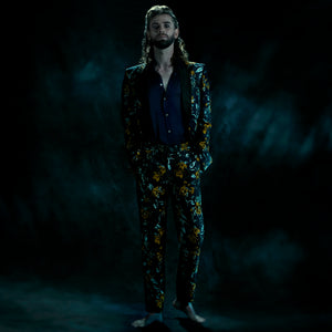 Tailored jacket in a blue and yellow brocade