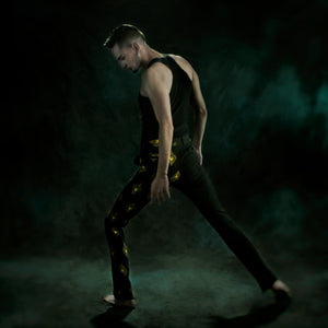 Black trousers with yellow golden sacred hearts