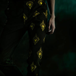 Black trousers with yellow golden sacred hearts
