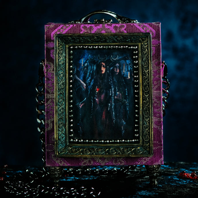 Cartera Hecate en brocado púrpura y plata 