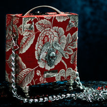 Load image into Gallery viewer, Framed Bloody Mary on a red brocade handbag