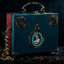 Load image into Gallery viewer, Ana de Mendoza framed eye on turqoise taffeta handbag