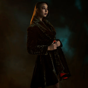 Black faux fur coat with red rose button