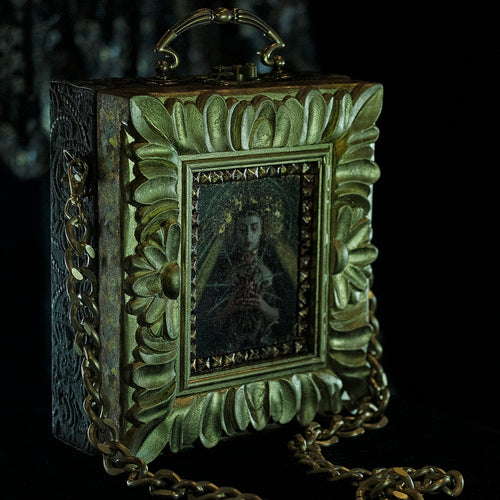 Virgin of Sorrows in a hand carved frame hand bag