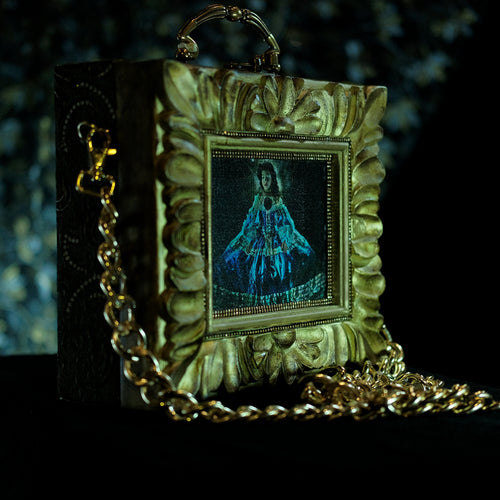 La Infanta in a hand carved frame hand bag