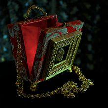 Load image into Gallery viewer, Framed Cage on red brocade hand bag