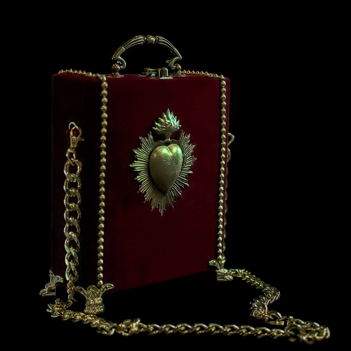 Gold sacred heart on velvet hand bag