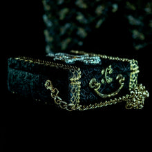 Load image into Gallery viewer, Yellow and clear rhinestones cross on black velvet hand bag